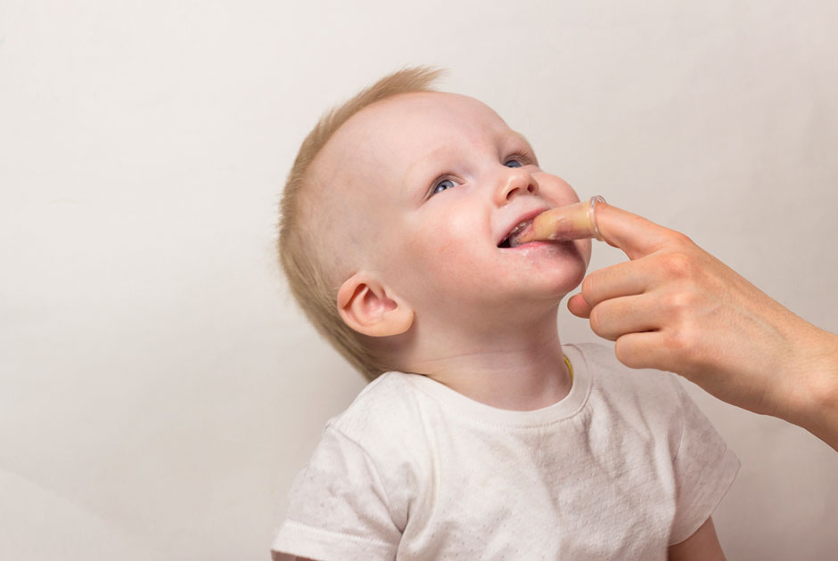 Dedal de silicona para limpiar encias de bebe